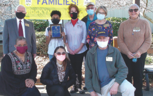 people standing in masks